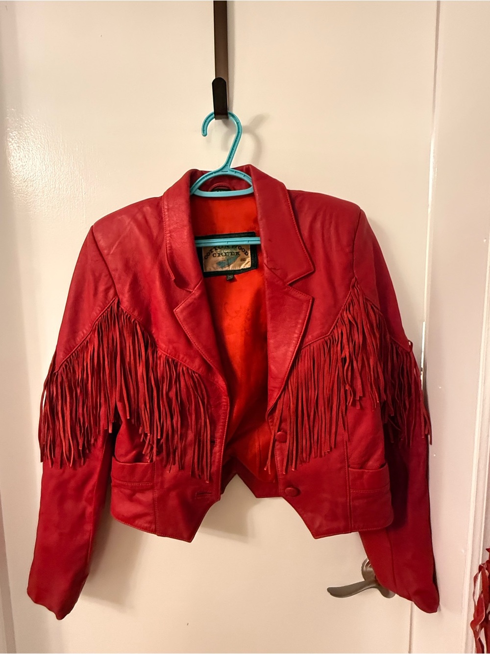 Women's Red Fringe Leather Jacket by Cotton Wood Creek.